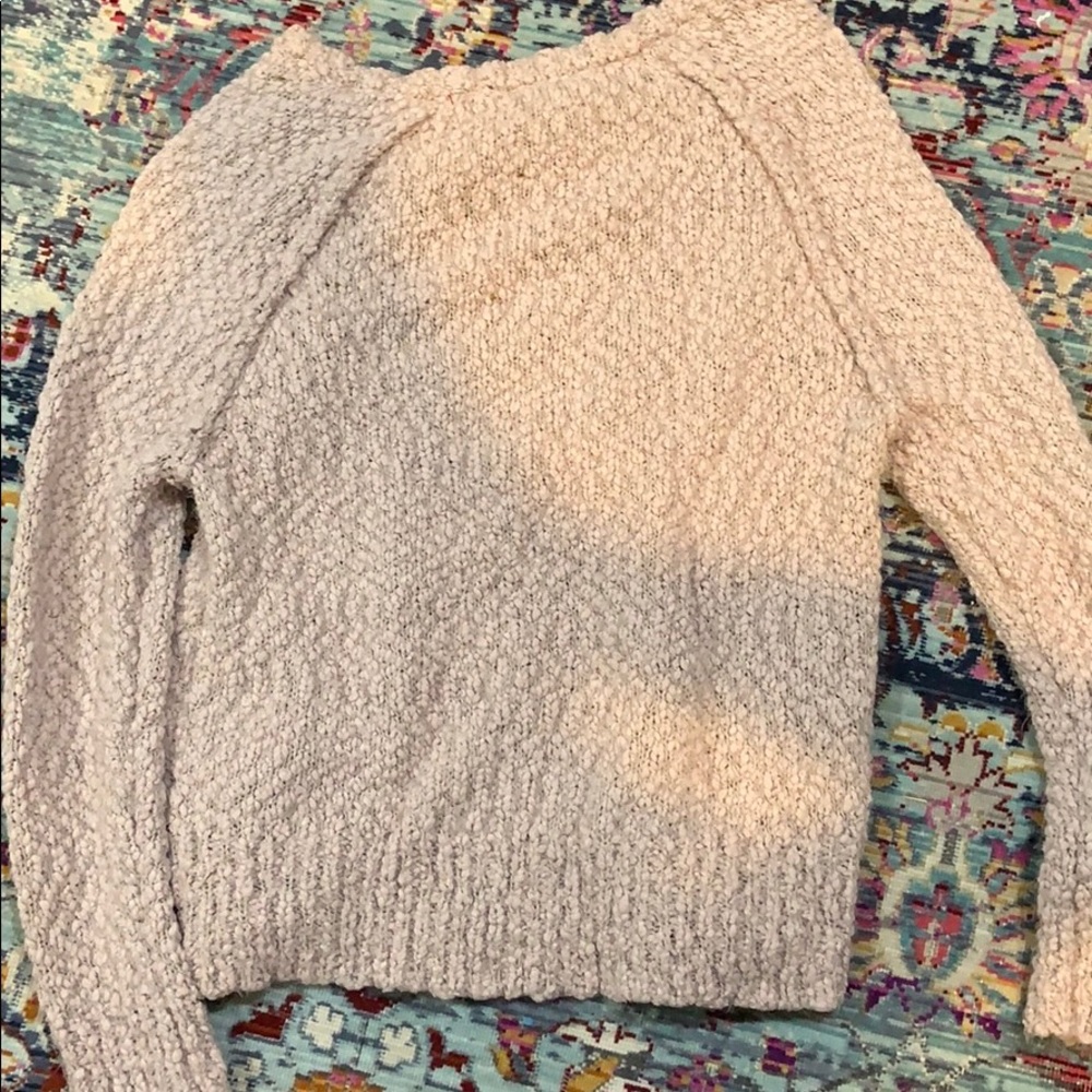 a sweater/ long sleeve shirt